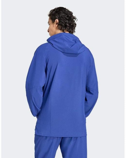 Adidas Blue Italy Tiro Travel Full Zip Windbreaker for men