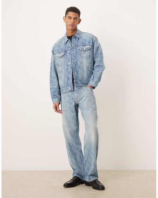 Calvin Klein Blue All Over Logo 90S Straight Fit Jeans for men