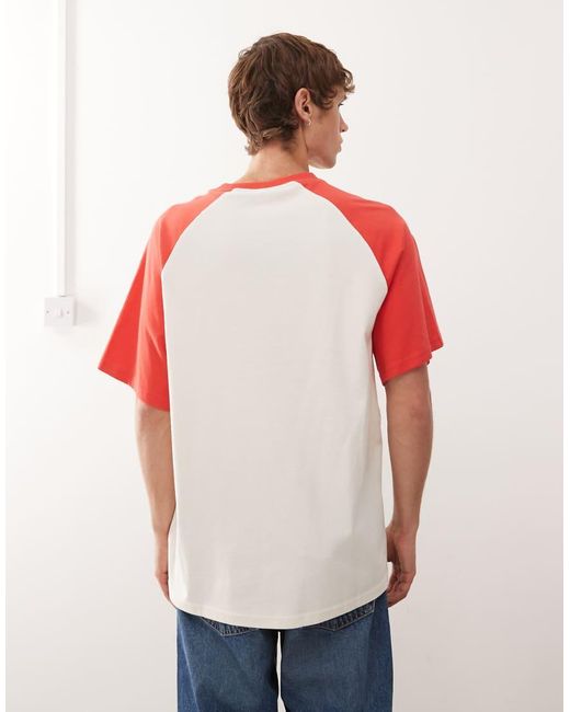 Camiseta Blanca Y Roja Extragrande Con Mangas Raglán Y Estampado En El Pecho De Karlkani de hombre de color Red