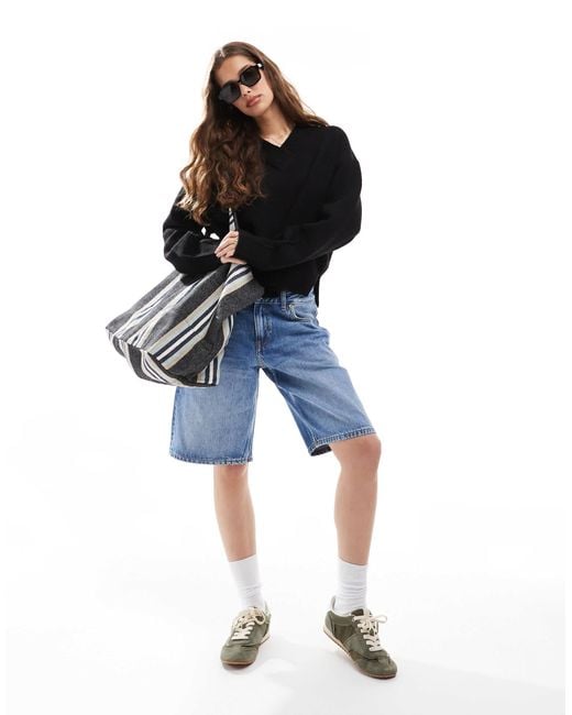 Pull coupe carrée à col v et fentes latérales ASOS en coloris Black