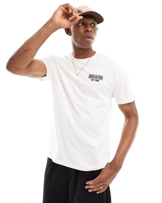 Camiseta color crema con estampado en la espalda Hollister de hombre de color White