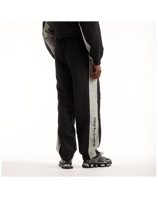 New Balance Gray Trackside Woven Pant for men