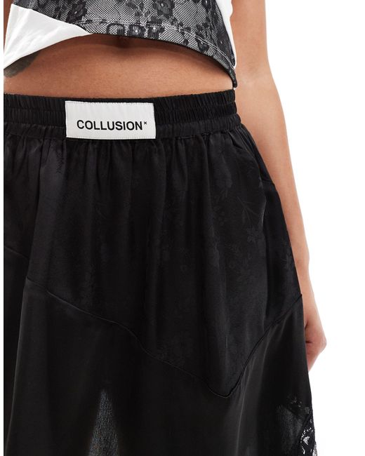 Mini-jupe asymétrique en satin jacquard et dentelle Collusion en coloris Black
