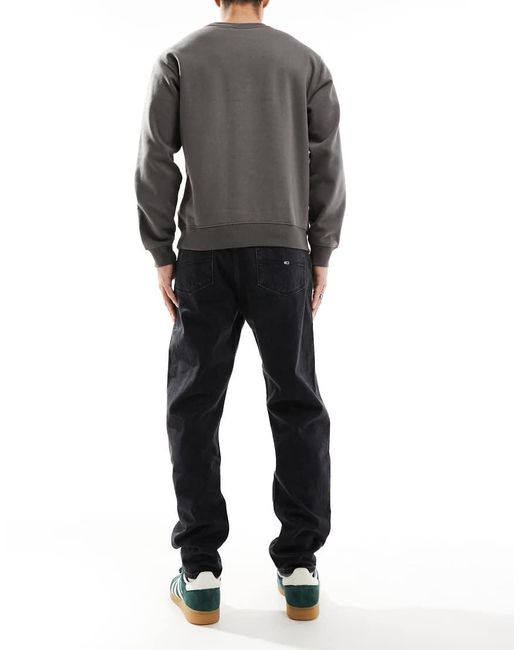 Vaqueros Negros De Corte Tapered Holgado Isaac De Tommy Hilfiger de hombre de color Gray