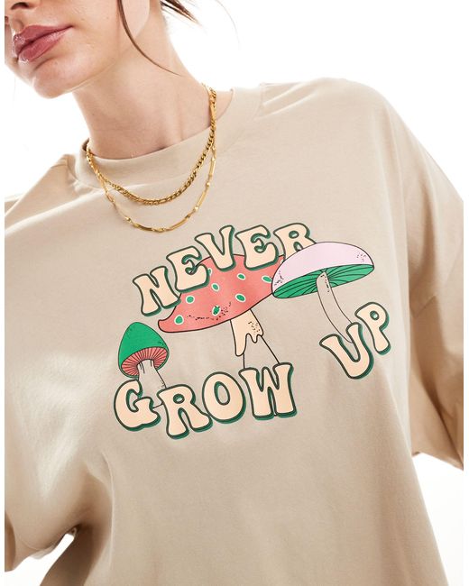 T-shirt crop top à imprimé « never grow up » - beige ONLY en coloris Natural