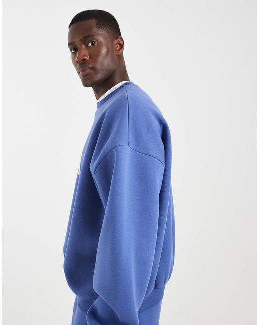 Sweat ras ASOS pour homme en coloris Blue