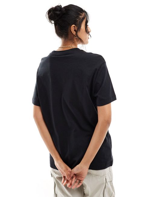 T-shirt oversize unisexe à logo virgule Nike en coloris Black