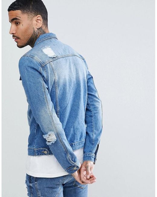 blue ripped denim jacket