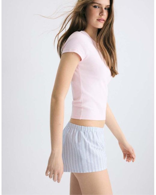 Stradivarius White Striped Buttoned Mini Shorts