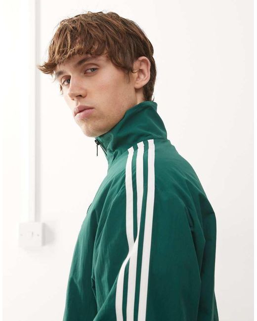 Adidas Originals Green Firebird Woven Track Top for men