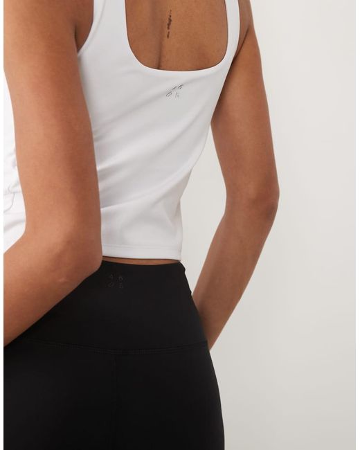 4505 White Soft Touch Scoop Neck Vest With Inner Bra And Removable Padding