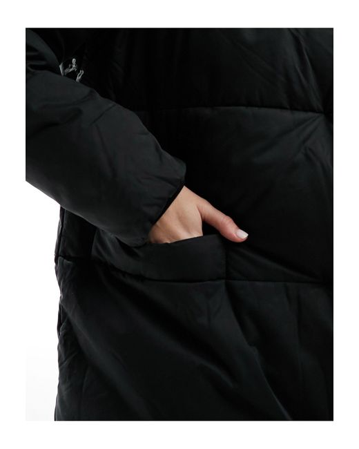 Cappotto oversize imbottito taglio lungo di Monki in Black