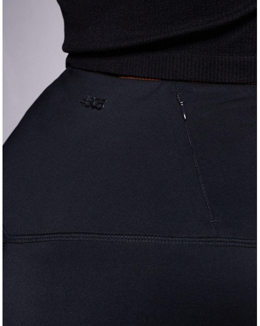 4505 Blue Hourglass Icon Active High Waist 5 Inch Legging Short With Zip Phone Pocket