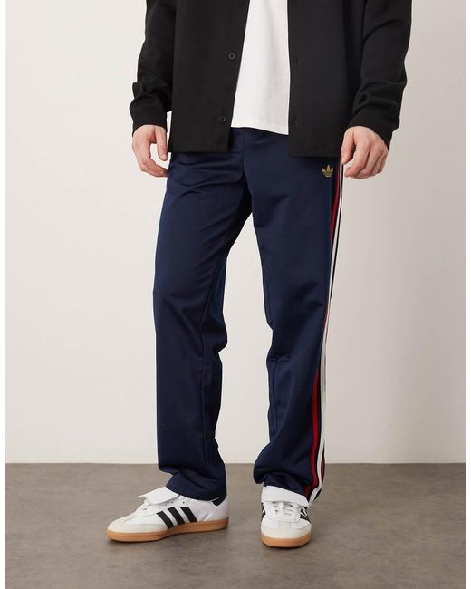 Adidas Originals Blue Firebird Track Pants for men