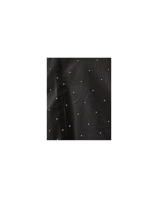 Mini-jupe en imitation cuir TOPSHOP en coloris Black