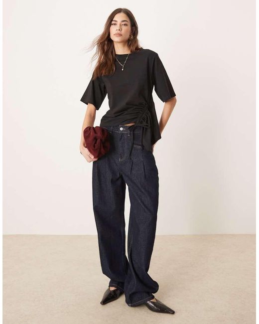 Camiseta Negra Extragrande Con Detalle De Godet Y Cordón Ajustable De ASOS de color Black