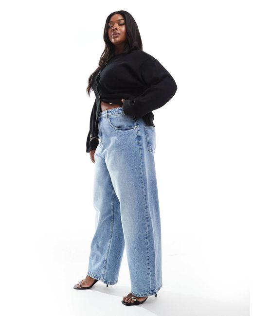 Asos design curve - jean bouffant à taille haute - délavage moyen ASOS en coloris Blue