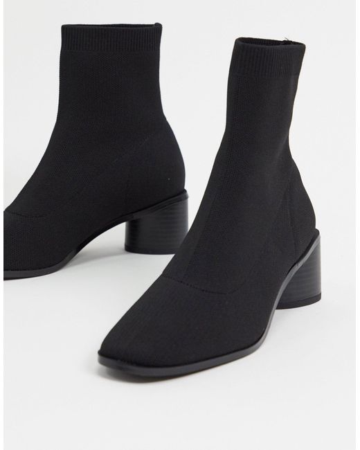 heeled sock boots black