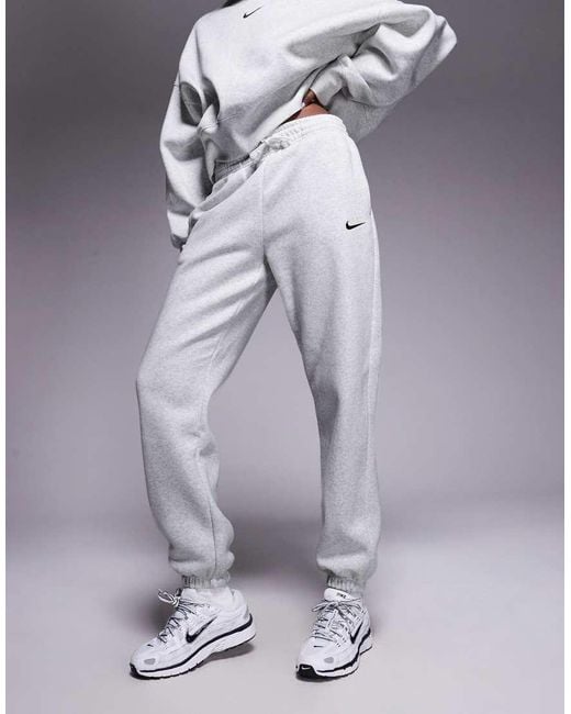 Joggers Grises Extragrandes De Talle Alto Phoenix Fleece De Nike de color Blue