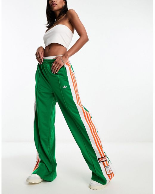 ADIDAS ORIGINALS FLARED LEGGINGS | Green Women's Casual Pants | YOOX