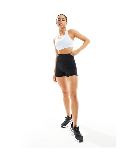 Swoosh dri-fit - reggiseno sportivo a supporto medio tinto di Nike in White