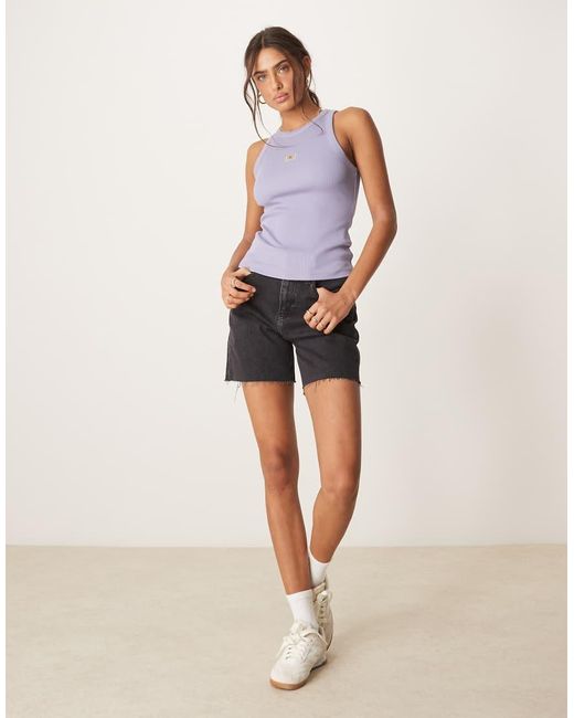 Calvin Klein Geribbelde Tanktop Met Geweven Label in het Purple