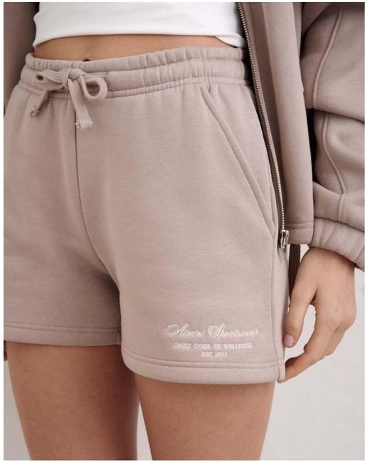 Script Aim'n de color Brown