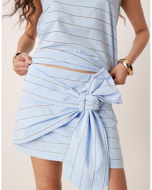 Minifalda Claro A Rayas Con Lazada Delantera De Algodón De (Parte De Un Conjunto) Mango de color Blue