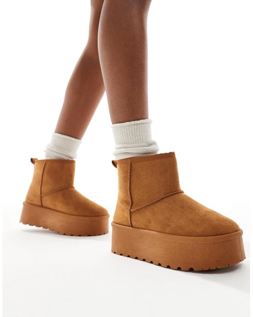 SEQWL White Flatform Boots