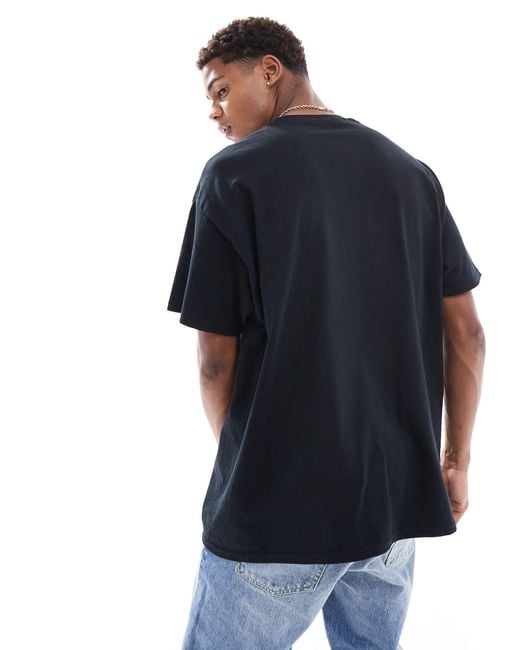 Camiseta negra extragrande con estampado deportivo ASOS de hombre de color Blue