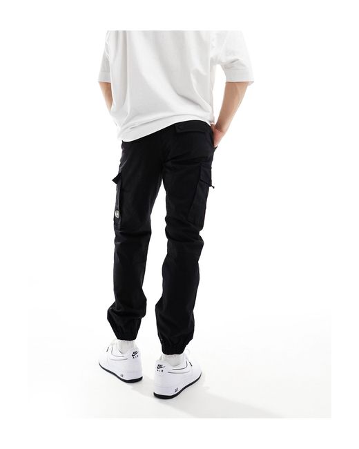 Criminal Damage White Cuffed Leg Cargo Pants With Side Leg Army Pockets for men