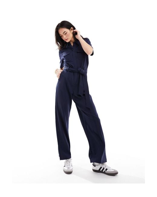 & Other Stories Blue Short Sleeve Jersey Jumpsuit With Patch Pockets And Tie Waist
