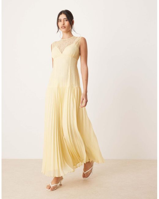 Robe longueur mollet avec corsage en dentelle et jupe plissée - citron ASOS en coloris Natural