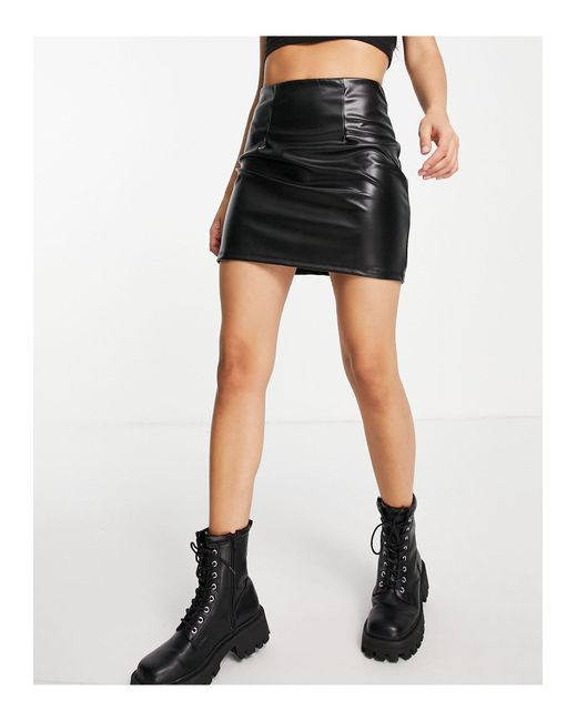 Mini-jupe ultra courte en imitation cuir à coutures apparentes - noir ASOS  en coloris Noir | Lyst