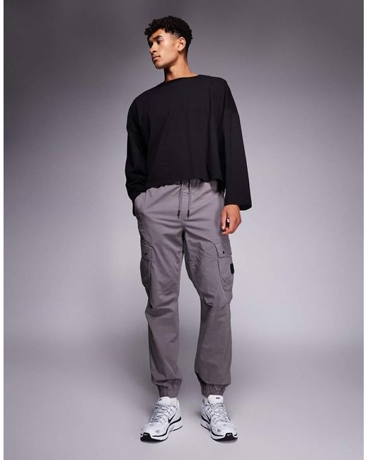 Pantaloni Cargo Regular Fit Scuro di River Island in Gray da Uomo