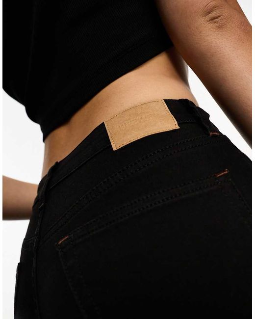 Vaqueros Negros De Corte Pitillo Y Talle Medio Spare De Weekday de color Black