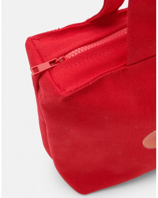 Mini tote bag à motif hibiscus Pull&Bear en coloris Red