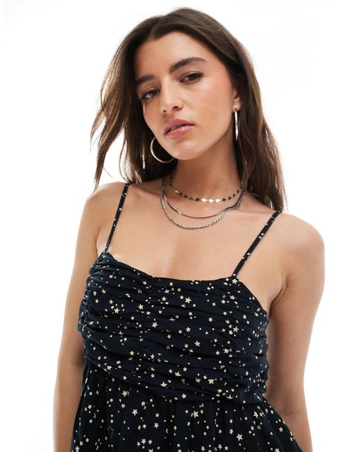 Stradivarius Black Stradivairus – str – schwingendes trägerkleid mit blumenmuster