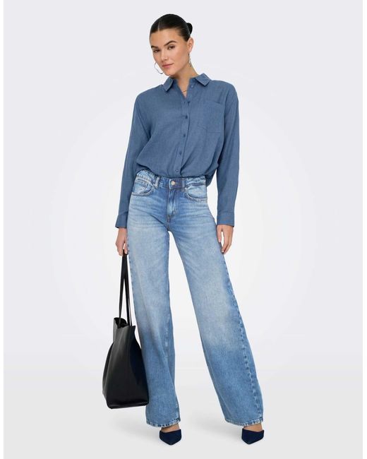 Jean ample - moyen clair ONLY en coloris Blue