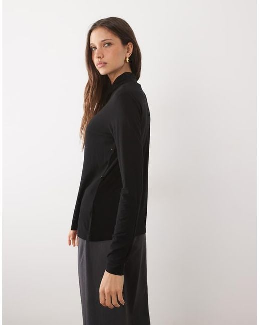 Iyal Black Bamboo Long Sleeve Wrap Cape Detail Top