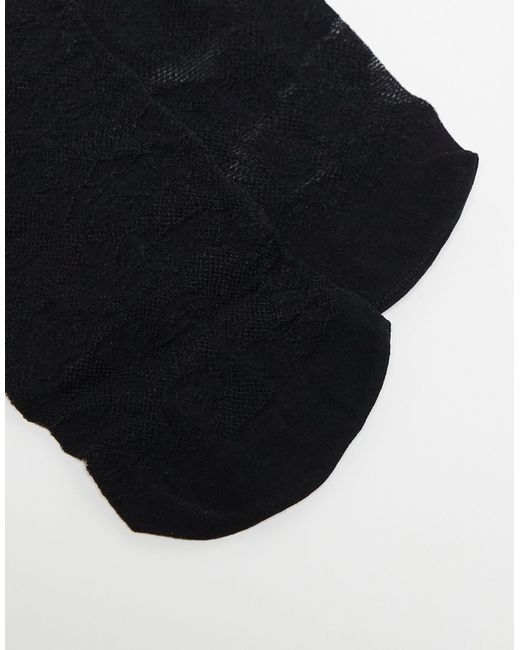 Confezione da 2 calzini al ginocchio neri e bianchi con rose di Monki in Black