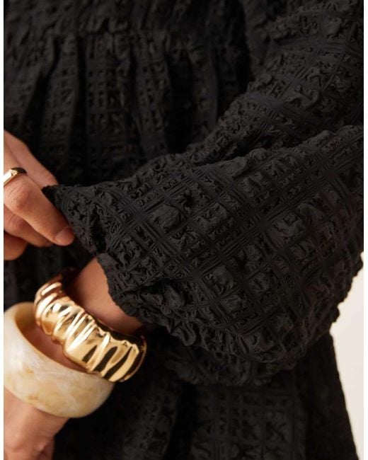 Gina Tricot Black Textured Mini Dress With Open Tie Back And Volume Sleeves