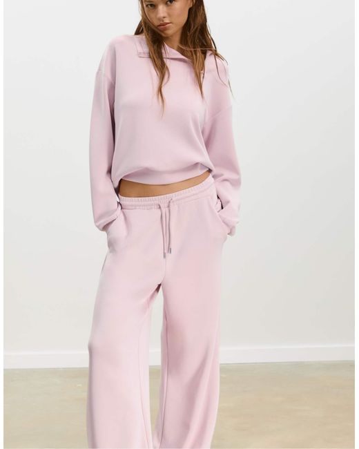 Pantalon palazzo doux - bubblegum Stradivarius en coloris Pink