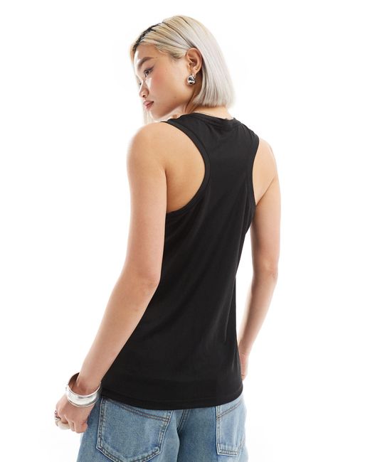 Camiseta negra sin mangas con logo PUMA de color Black