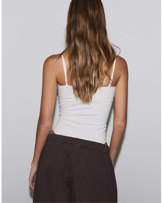 Stradivarius White Bodysuit With Blonde Lace Detail