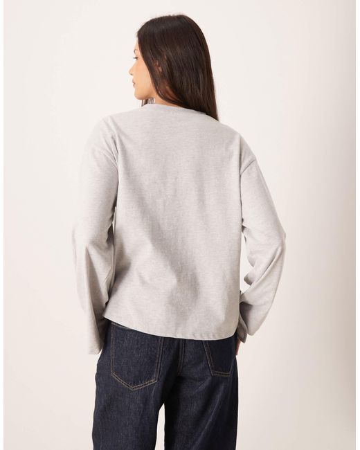 T-shirt coupe carrée avec manches longues et ourlet à basque asymétrique - chiné ASOS en coloris Natural