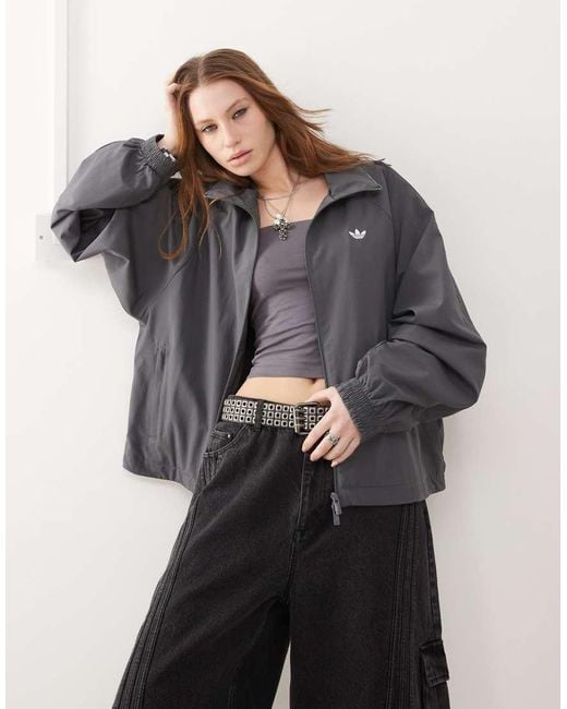 adidas Originals Adilenium Season 3 Woven Track Top in Grey