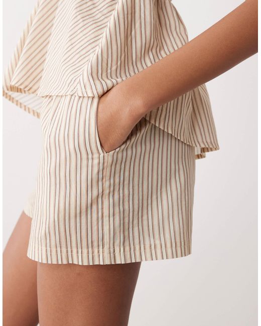 Mini-short d'ensemble Collusion en coloris White