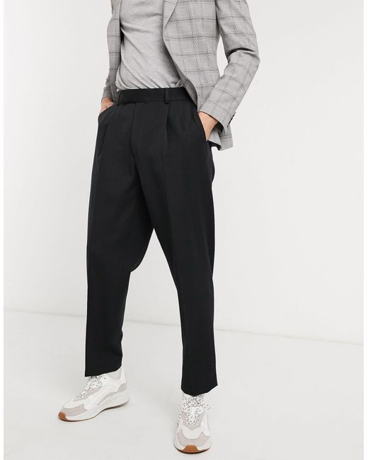 Uomo Abbigliamento da Pantaloni casual PantaloneMcQ in Materiale sintetico da Uomo colore Nero eleganti e chino da Pantaloni casual 