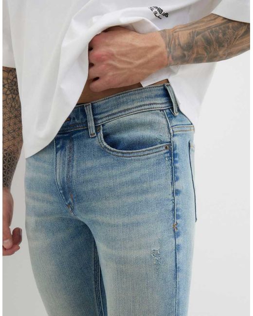 River Island White Spray On Skinny Jeans for men
